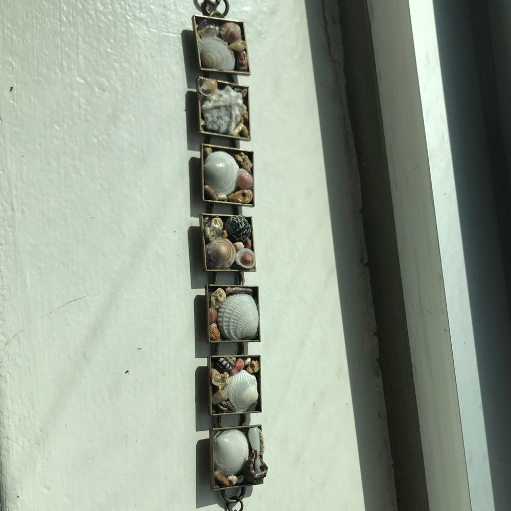 Seashell bracelet made in Puerto Rico on beach